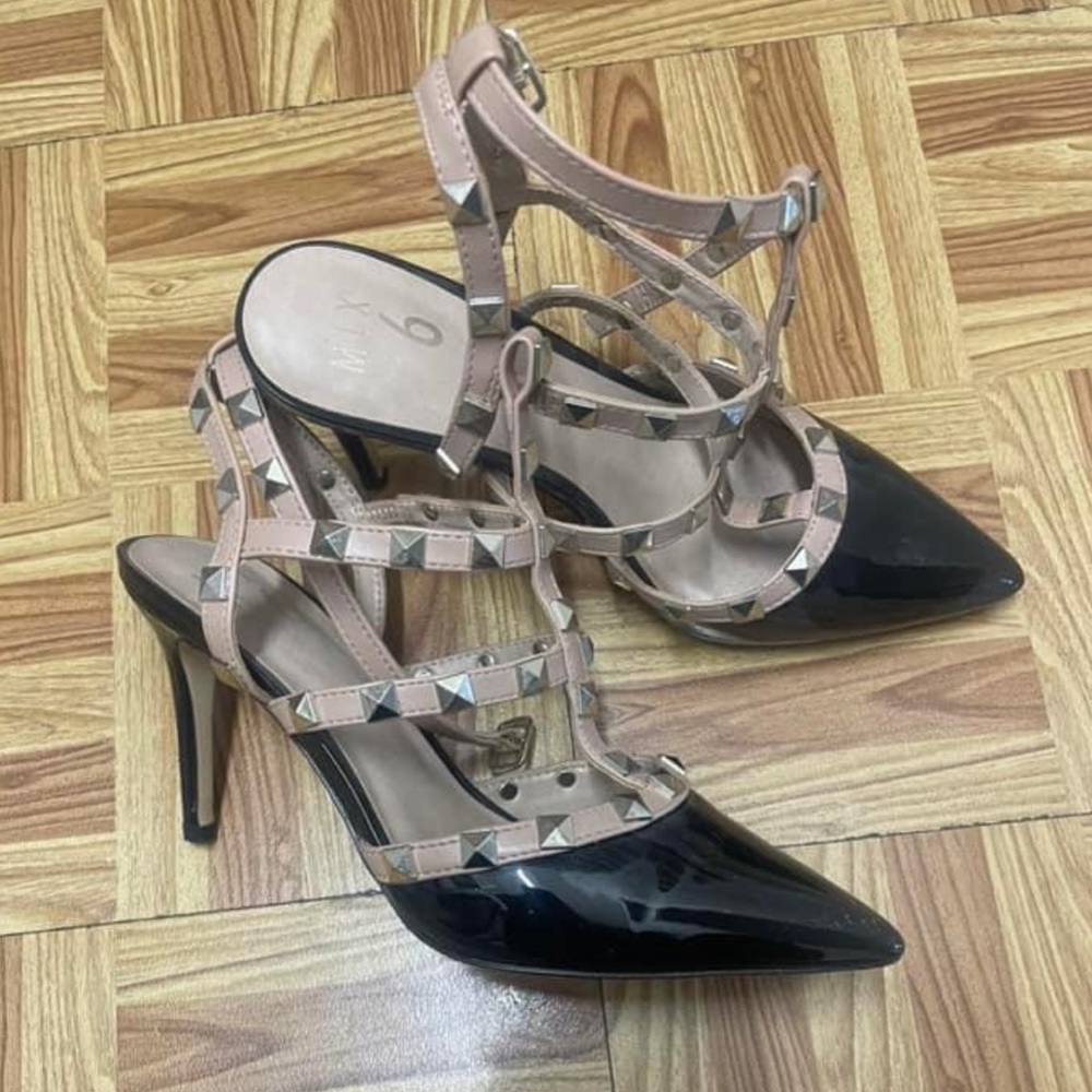 Black and nude heels. Worn once. 7.5